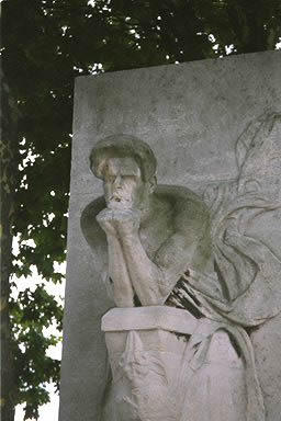 Charles Baudelaire portrait face looks Statute Cemetery Paris Grave